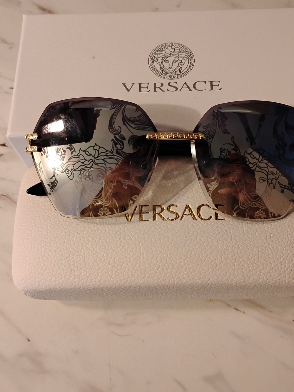 Versace Women's Gradient Black-Grey Rimless Sunglasses with Gold Accents